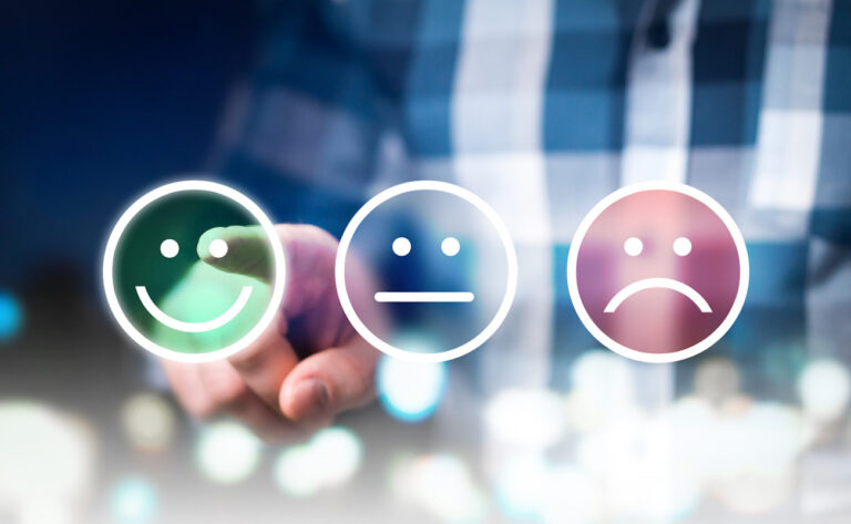 Business man giving rating and review with happy, neutral or sad face icons. Customer satisfaction and service quality survey